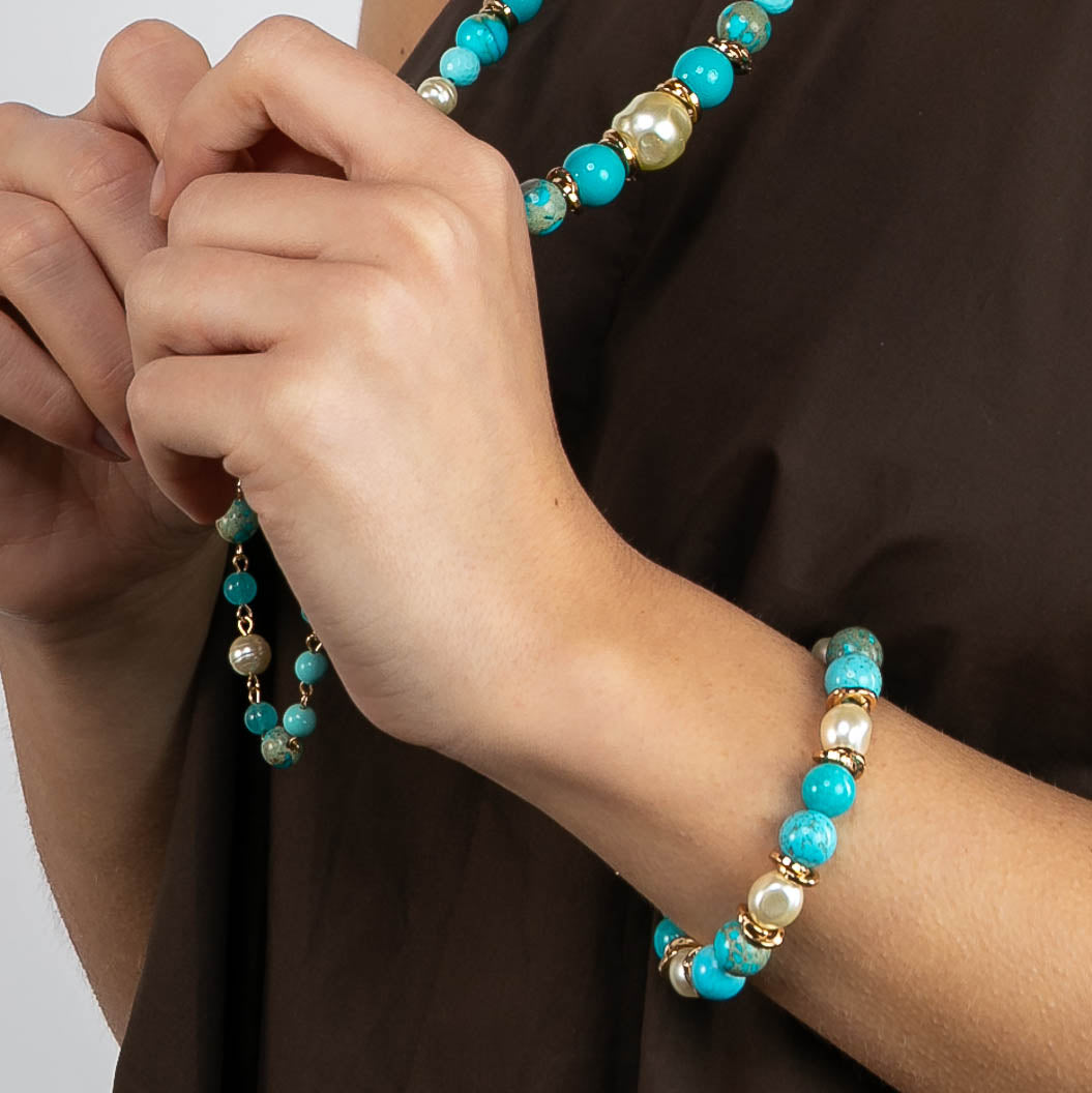 Bracciale elastico in pietre dure turchesi e perla