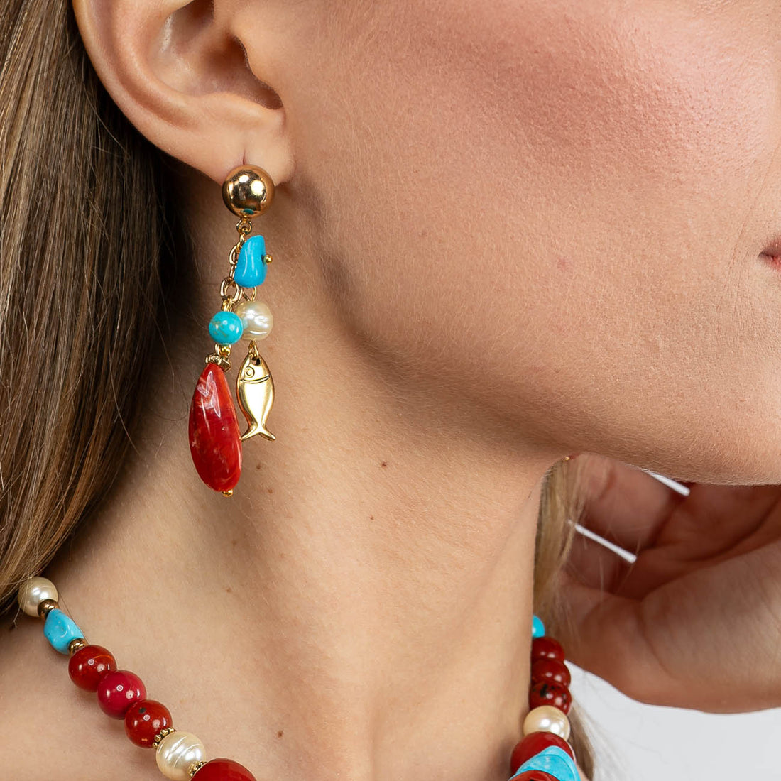Orecchini pendenti con conchiglie e pesci
