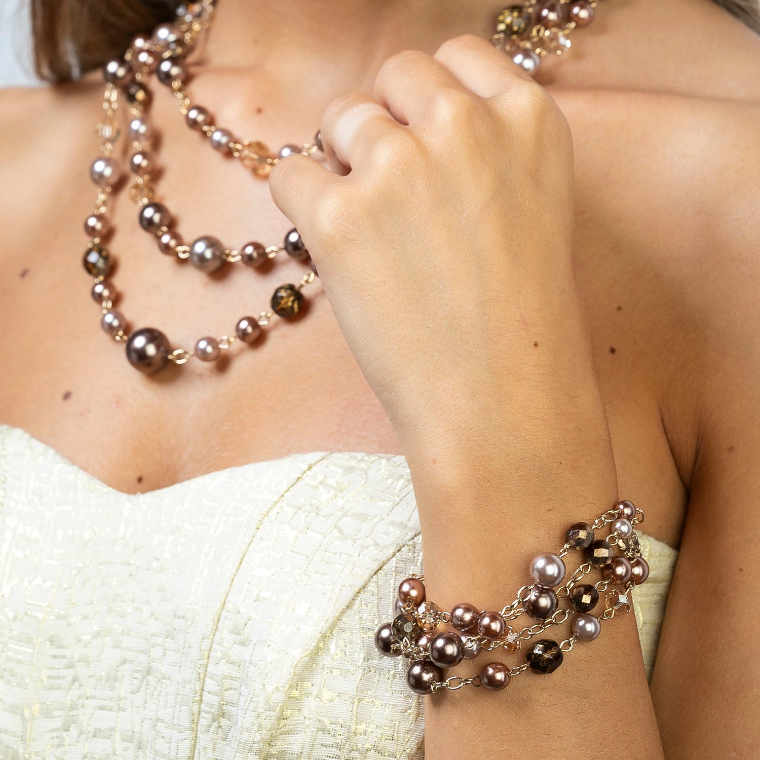 Multi-strand pearl and crystal bracelet