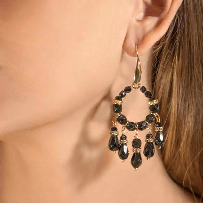 Hoop earrings with black crystal pendants